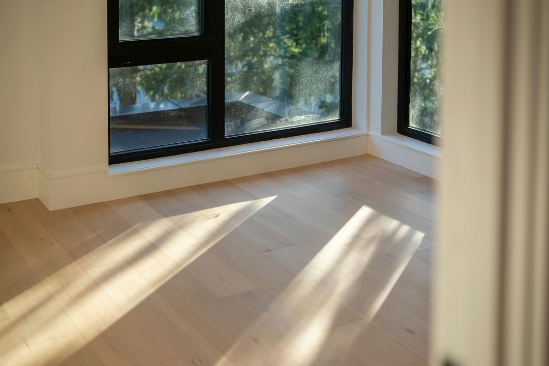 Sunlight on light wood-look flooring