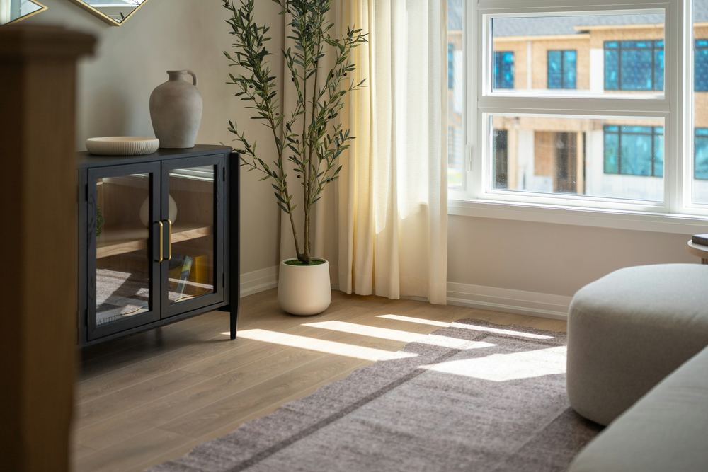 A living room with light flooring