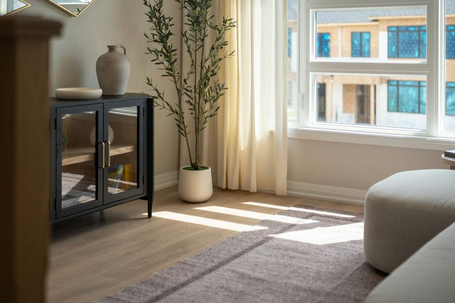 A living room with light flooring